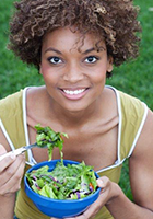woman holding salad